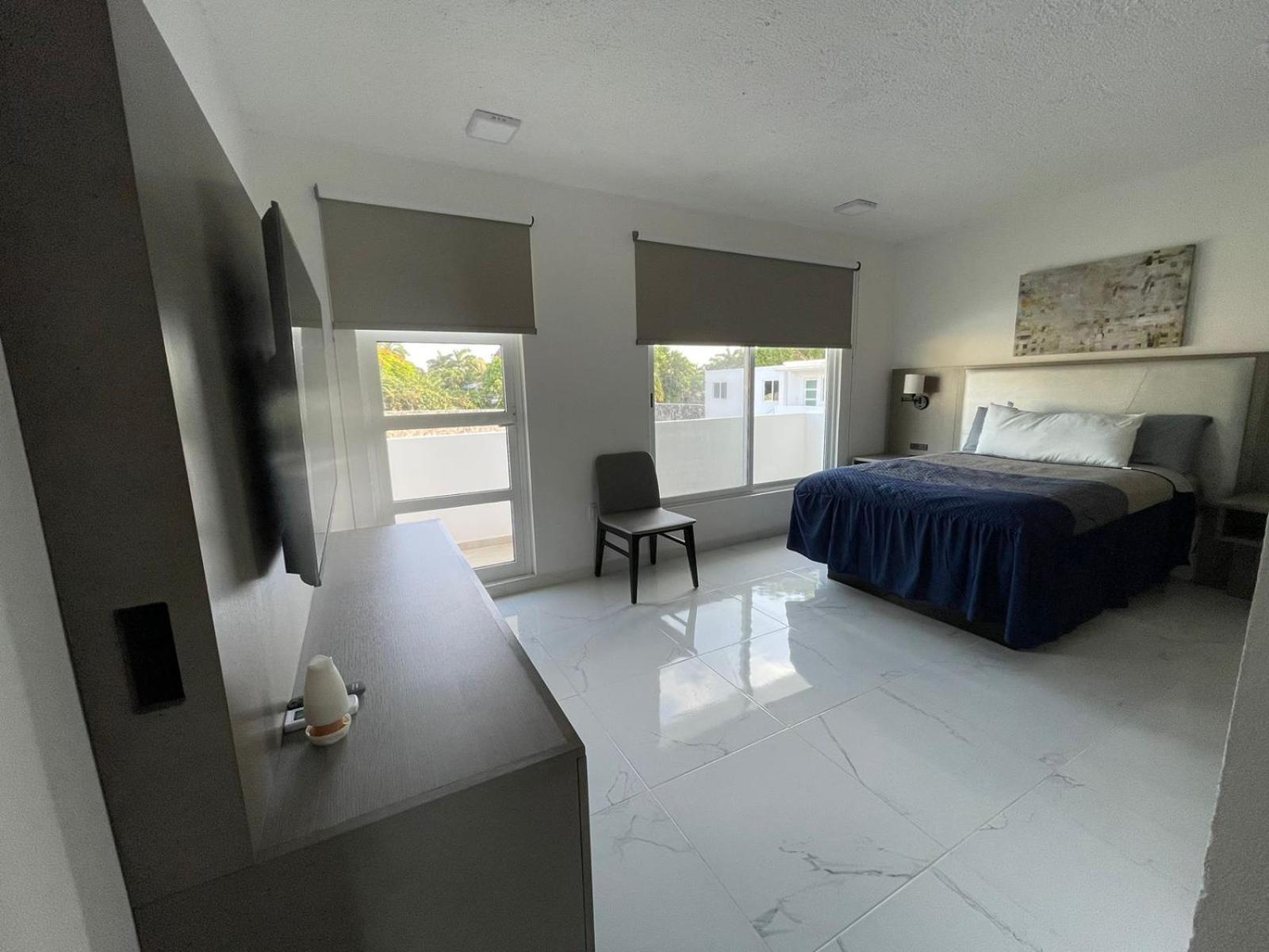 Guest House Stone Wall Residences Cancún Esterno foto