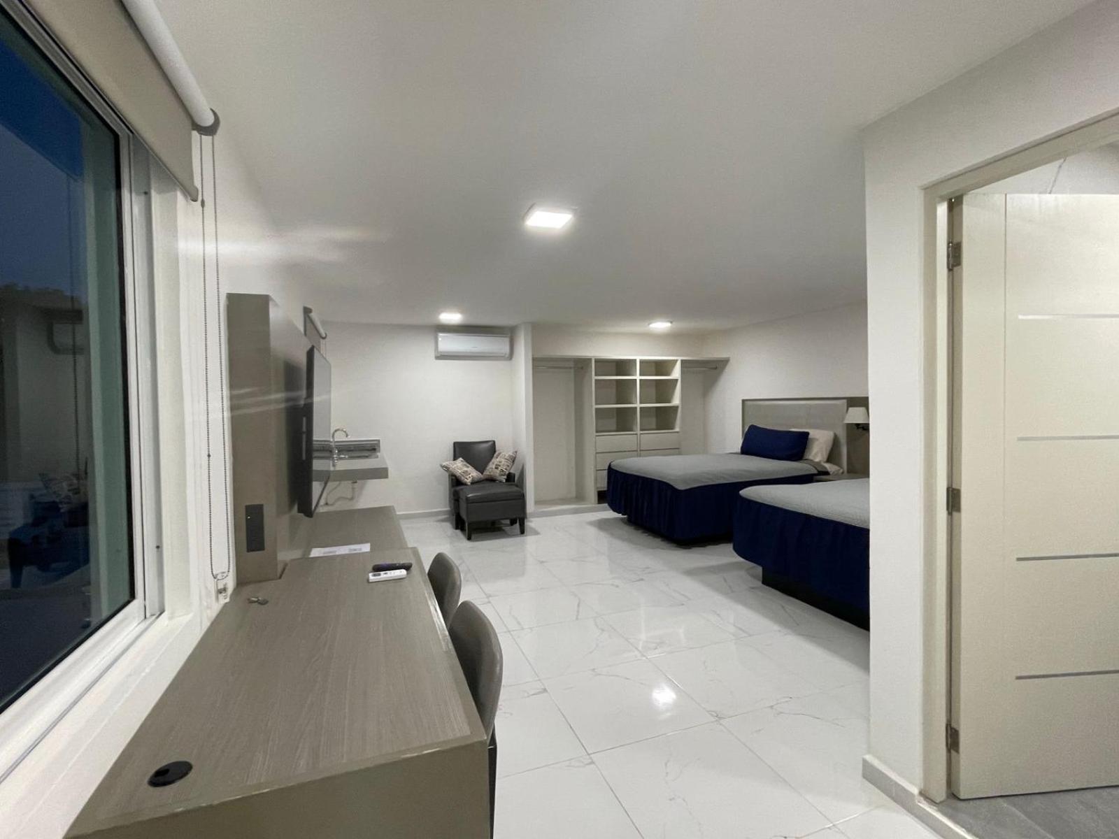 Guest House Stone Wall Residences Cancún Esterno foto