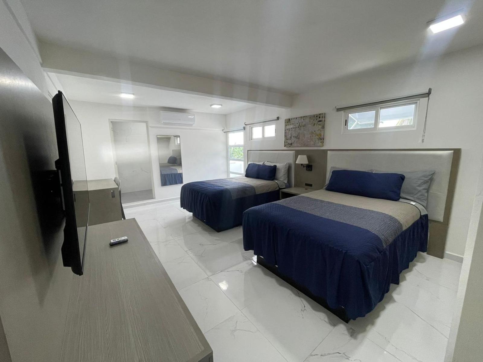 Guest House Stone Wall Residences Cancún Esterno foto