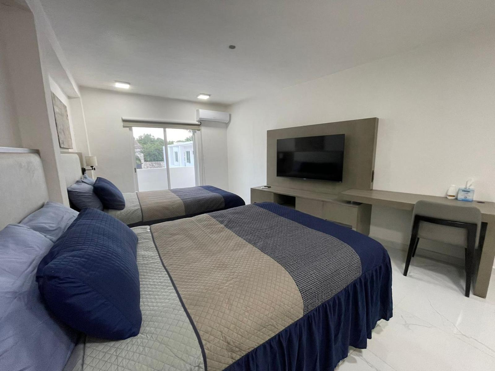 Guest House Stone Wall Residences Cancún Esterno foto