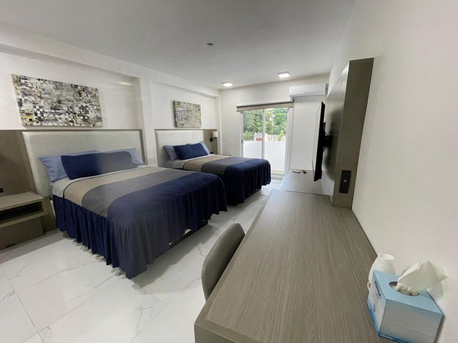 Guest House Stone Wall Residences Cancún Esterno foto