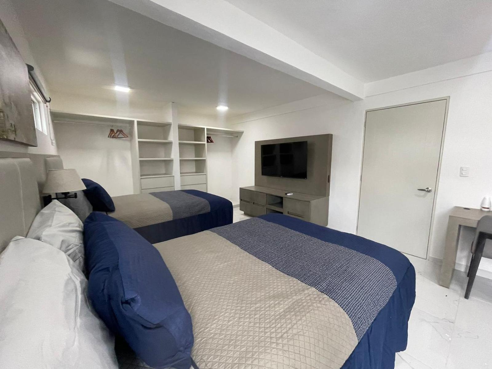 Guest House Stone Wall Residences Cancún Esterno foto