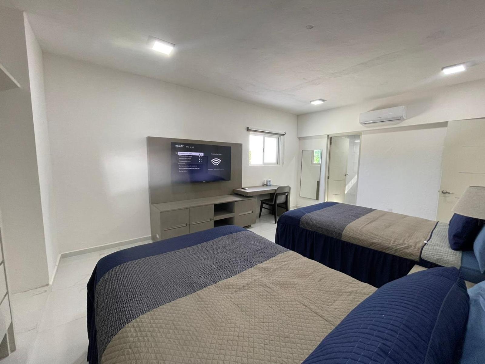 Guest House Stone Wall Residences Cancún Esterno foto